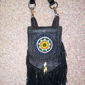 Vintage handmade leather fringe purse